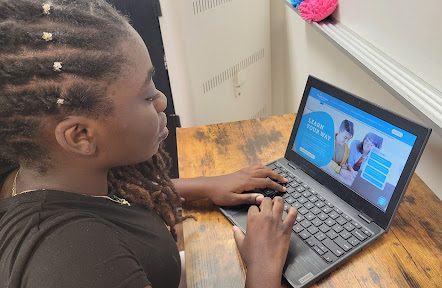 Freshman Amariah Kelland-Green logs into her online driver’s education course. This course is now required for students in order to get their learner’s permit.