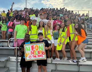 The first home football game of the season had many students supporting the team, the cheerleaders and the marching band. Students supporting students is one of the many ways to build community in school.