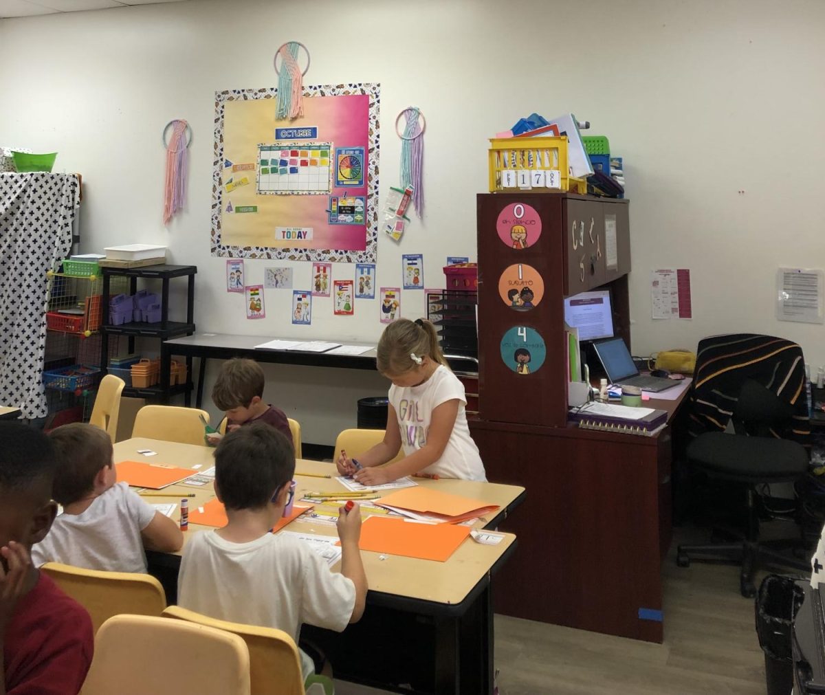 Elementary Spanish students work to develop second language skills. Learning a second language can be very beneficial to students.