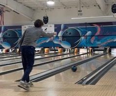 Senior Liam Hutchison participates in the junior and senior positive badge trip to the bowling alley and lunch at the mall.