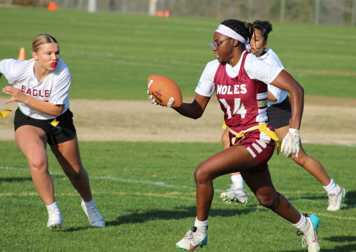 Senior Danielle White looks for an opening as Wakulla defenders close in. Playing multiple positions, White relies on awareness and versatility to support her team.
Photo courtesy of Danielle White.