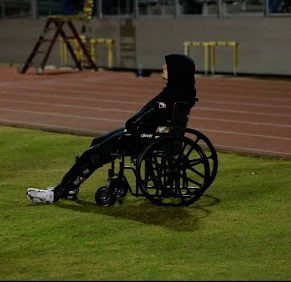 Sophomore Josey Johnson sits on the sidelines during a varsity football game. Johnson was injured in practice midseason, which put him out for the remaining games and practices.
Photo courtesy of Alex Baum.