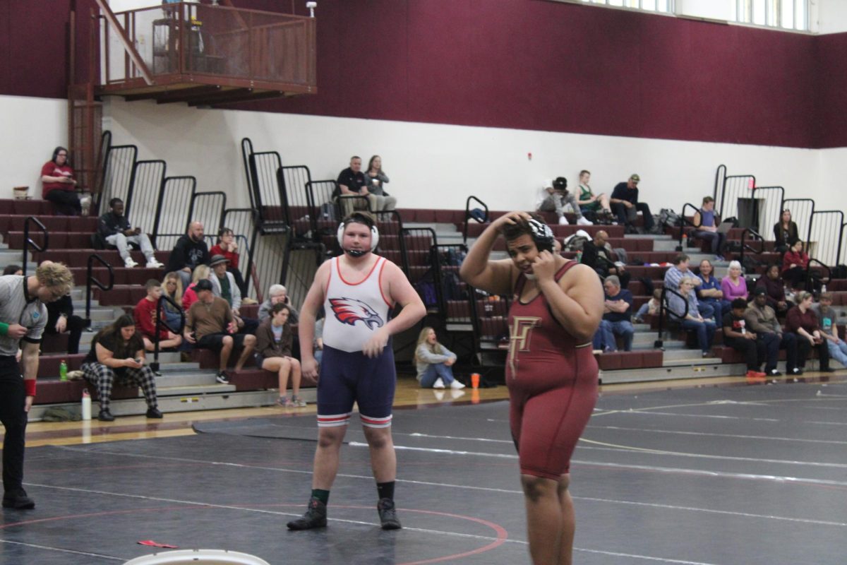Freshman Darryl Ray (on right) prepares for his match against a Wakulla opponent.