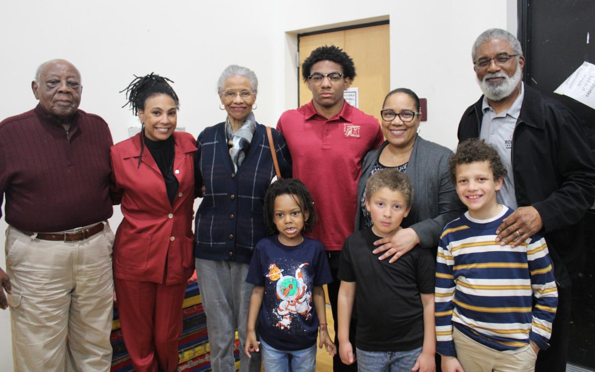 Senior Terence Hinson has his parents and other family members to support him on wrestling's Senior Night.