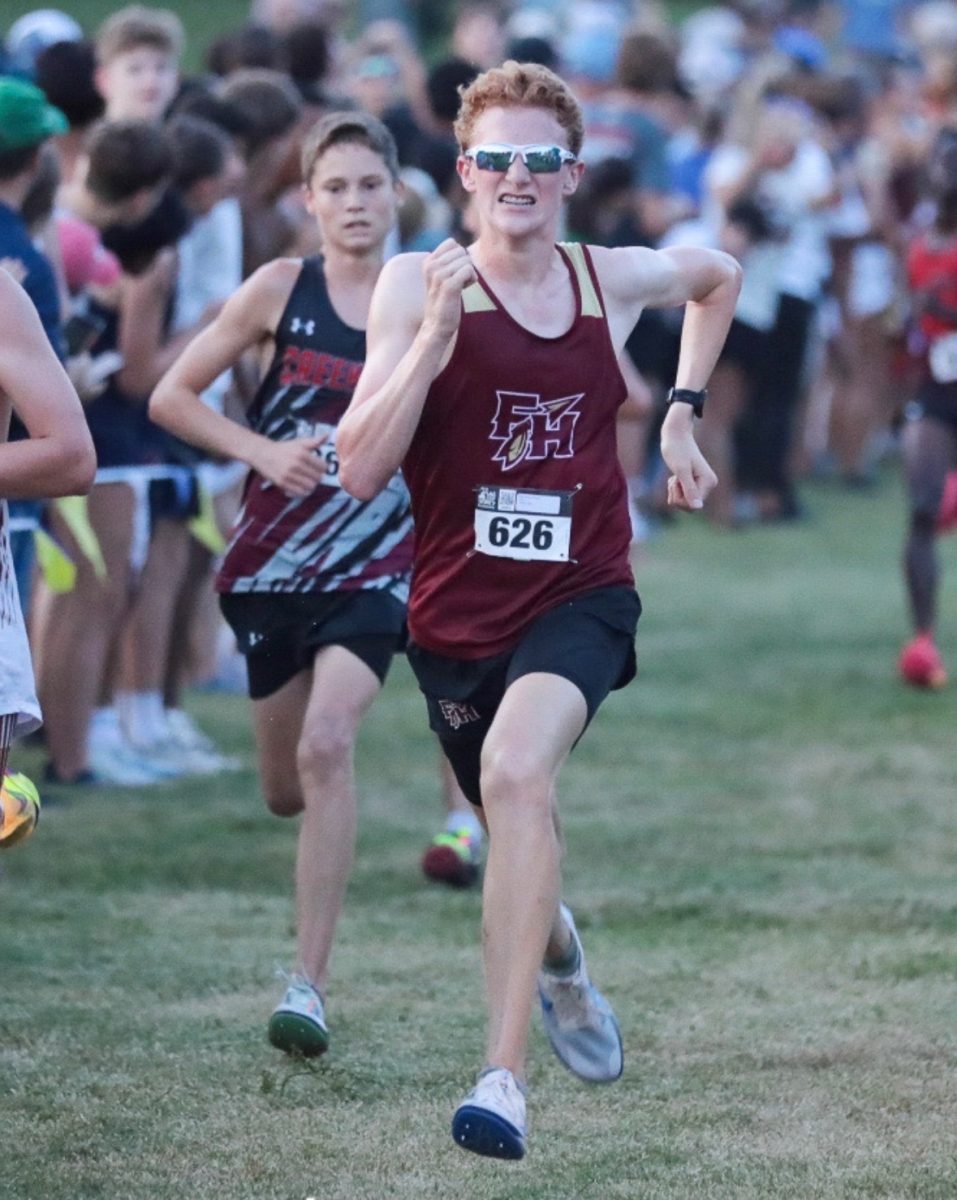 Phillips pushes his pace in the final stretch of a meet to finish strong. The underclassman finished 60th out of 351 elite boys at the Cecil Field Summer Classic with a time of 16:50.

Photo courtesy of Lawson Phillips