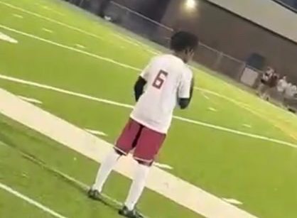 Sophomore Antwan Kelly waits on the side line to to in to a soccer game last season. Kelly mangages to balance his life as student-athlete with his classwork, keeping track of all the high-pressure expectations.
Photo courtesy of Antwan Kelly.