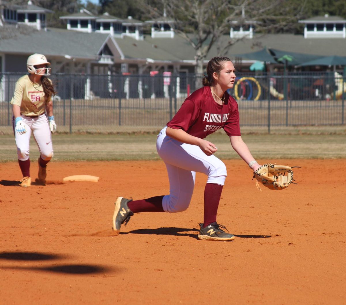 Junior Ansley Hurst fields the ball during last year's seventh period softball class. This year, the varsity team must readjust practices and conditioning with the loss of the class.